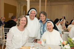 Sister Mary Christopher is joined by family and friends at the luncheon.
