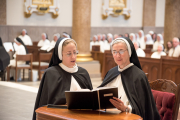 20-Sister Lydia Marie professes her vows publicly as she kneels next to Mother Anna Grace.