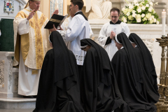 At the conclusion of Mass, Bishop Spalding prays for the sisters. At the conclusion of Mass, Bishop Spalding prays for the sisters.