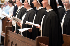 The sisters sing the Gloria. The sisters sing the Gloria.
