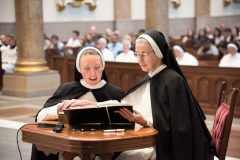 The sister professes her vows of poverty, chastity, and obedience publicly before the congregation. The sister professes her vows of poverty, chastity, and obedience publicly before the congregation.