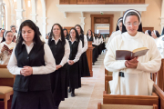 The postulants process into the chapel to be pinned by Mother Anna Grace.