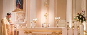 Bishop Spalding incenses the altar during the Closing of Forty Hours Devotion at St. Cecilia Motherhouse