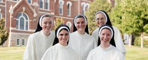 group of sisters in front of motherhouse