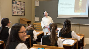 Postulants taking a doctrine class